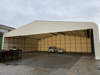 392 海上コンテナからデバンニングした商品の仮置き大型テント倉庫（有）岡田商会